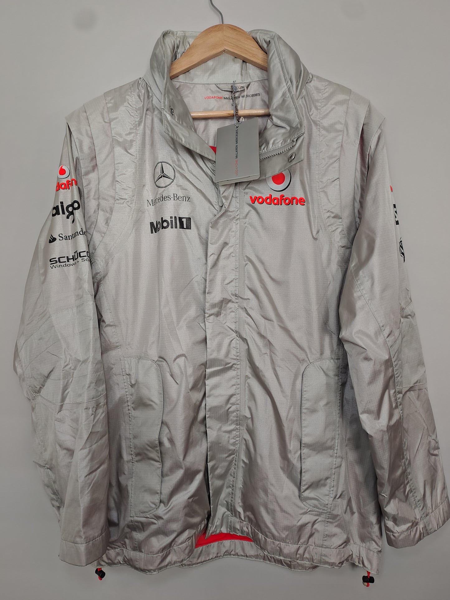 Official Vodafone McLaren Mercedes silver team mens rain jacket BNWT Lewis Hamilton